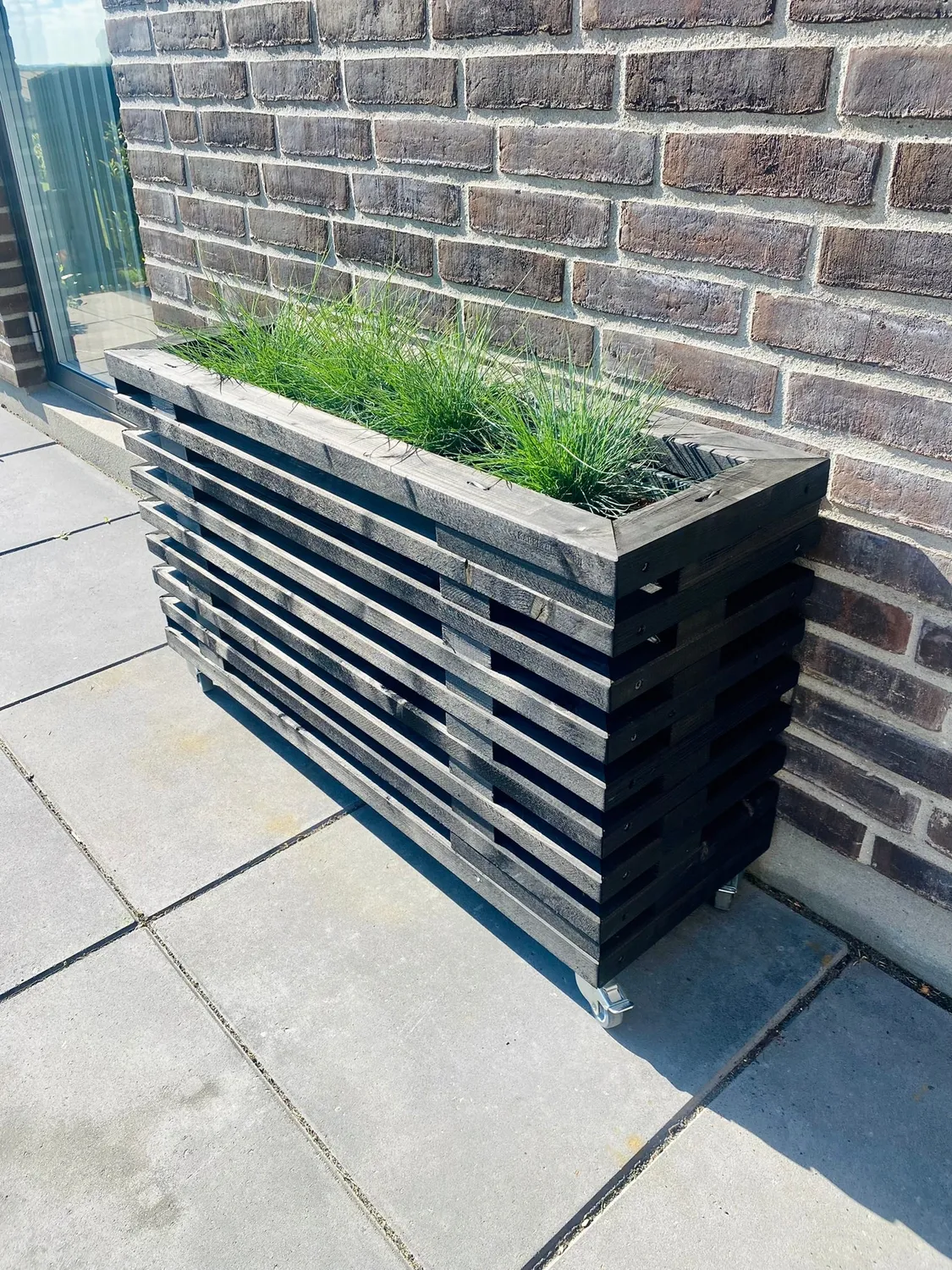 Kabeltromlen Traller blomsterkasse sort 95 cm på hjul