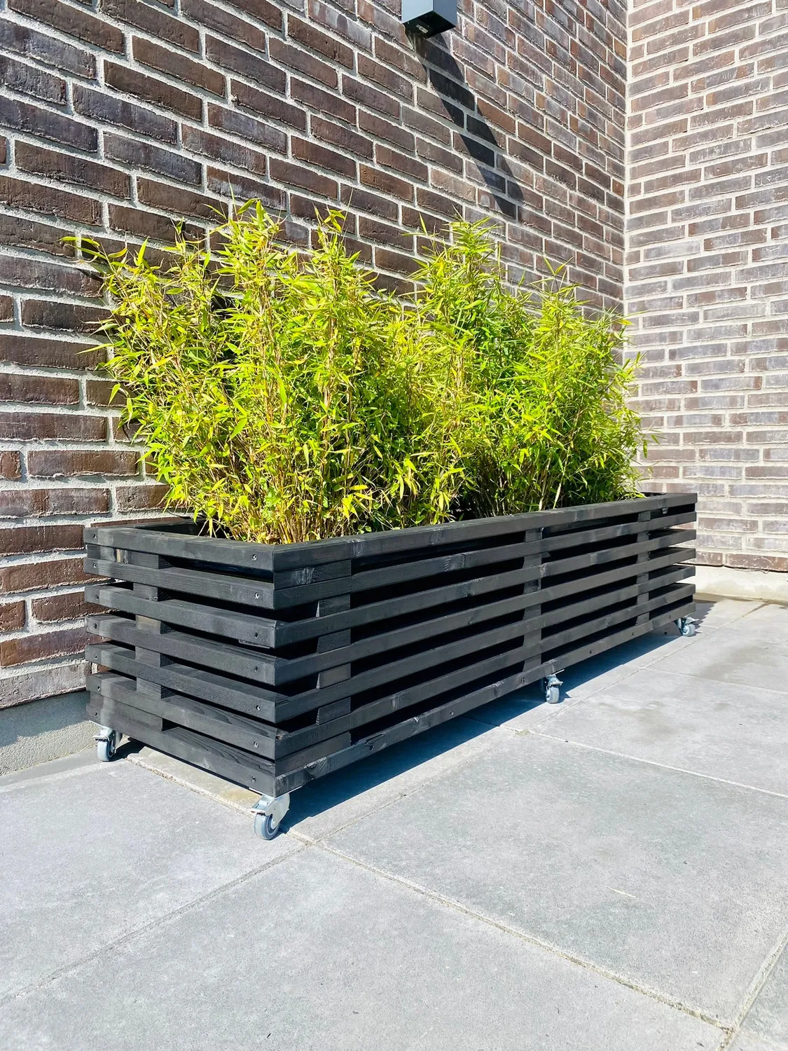 Kabeltromlen Plantekasse af Traller 95 cm sort