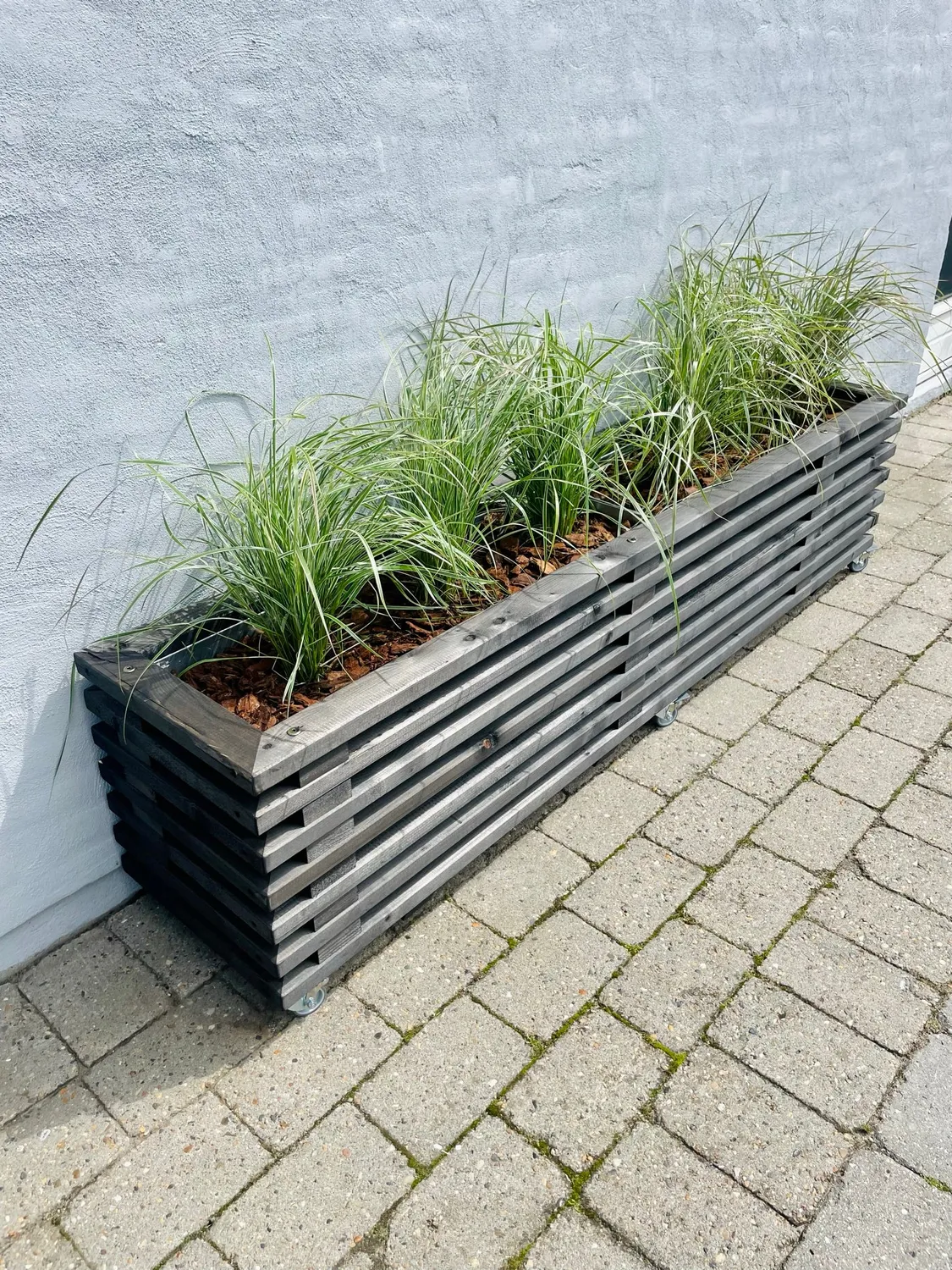 Kabeltromlen Luksus plantekasse sort 95 cm på hjul